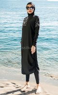 Gesluierde vrouw burkini Jasmina zwart witte patronen – The Kaftan